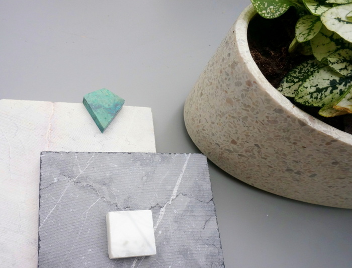 Stone planter and marble tiles