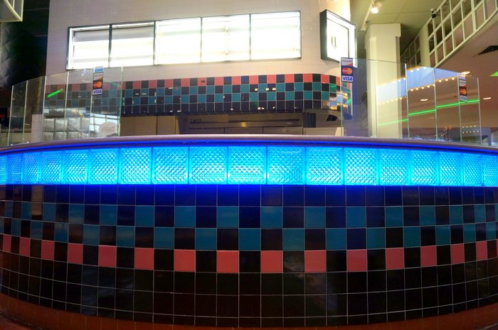 Glass block and neon lighting at the food court
