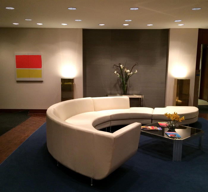 An '80s-style sectional sofa in the waiting room of the venture capital firm