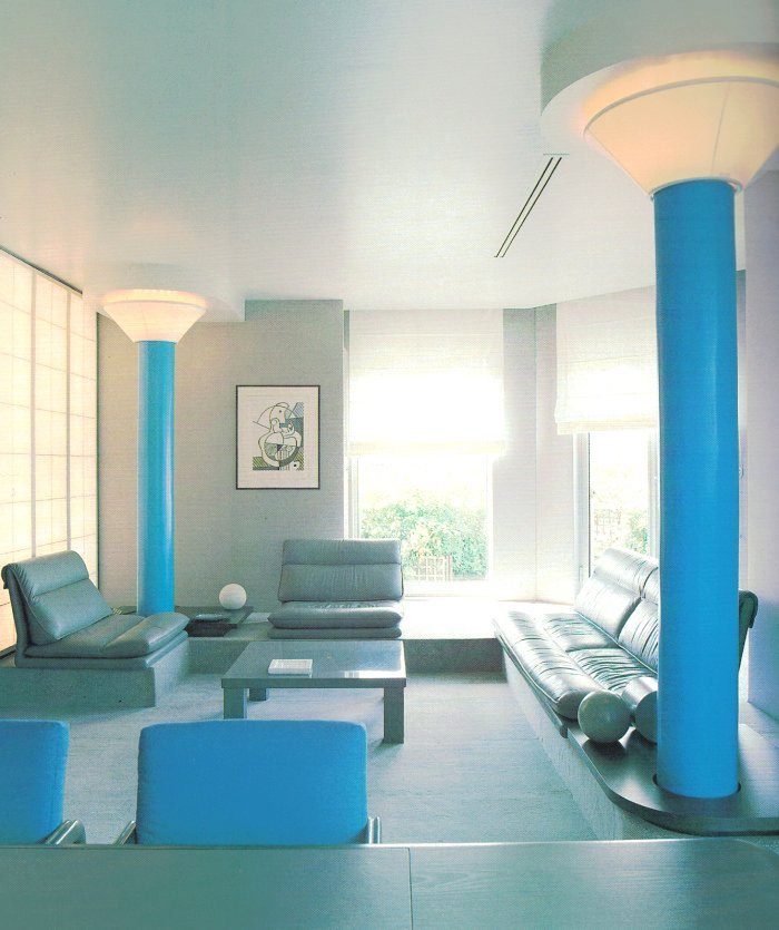 Custom tower lighting in an '80s modern living room