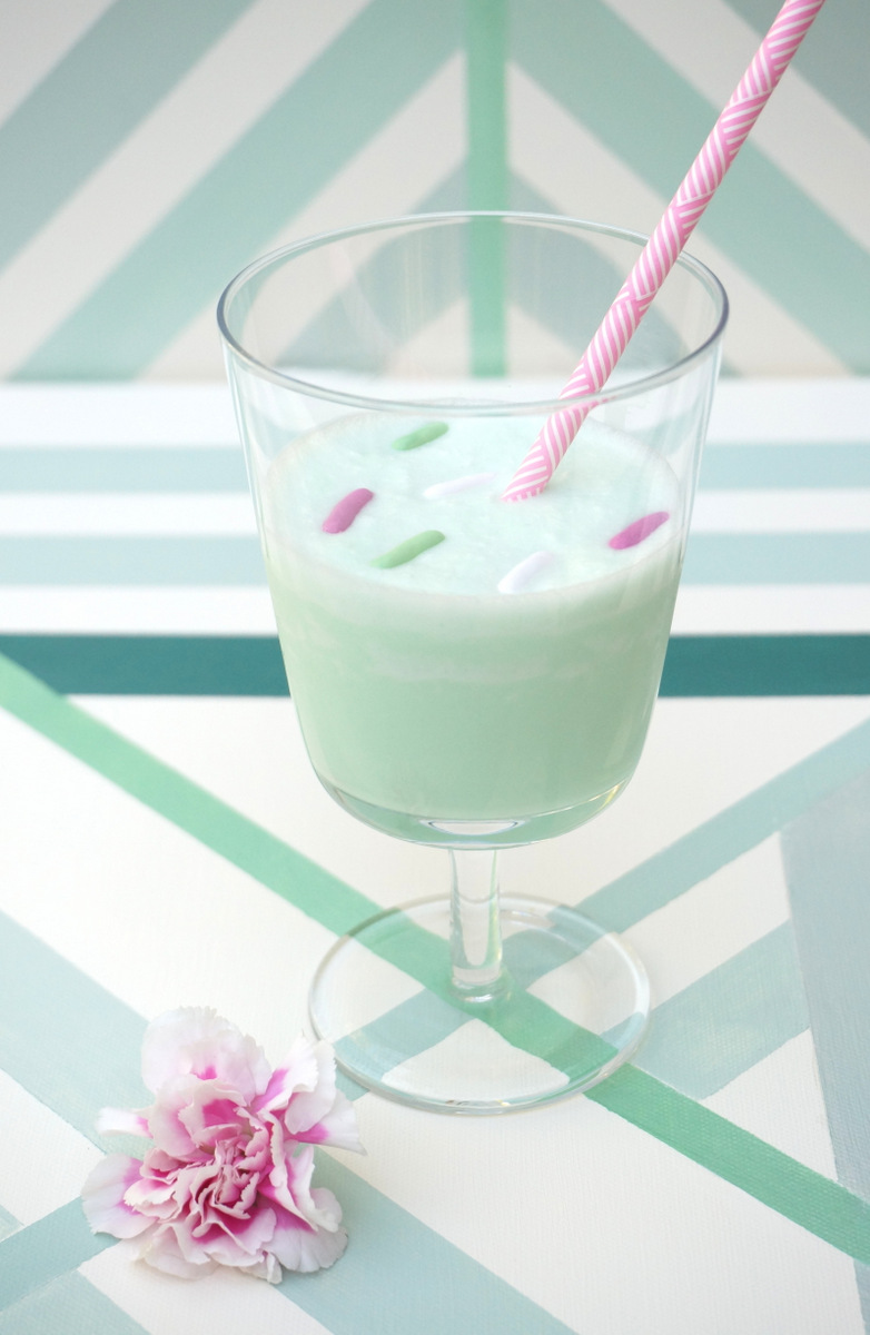 Minty milkshake with a pink straw