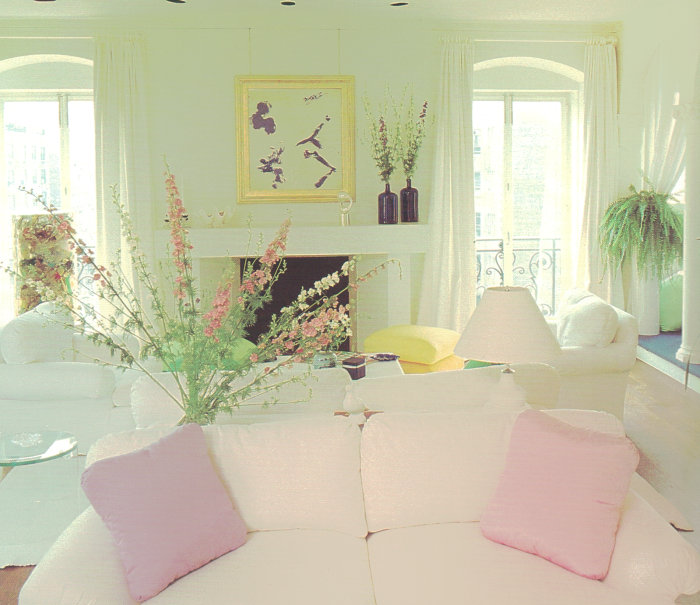 Pastel pillows in an '80s living room
