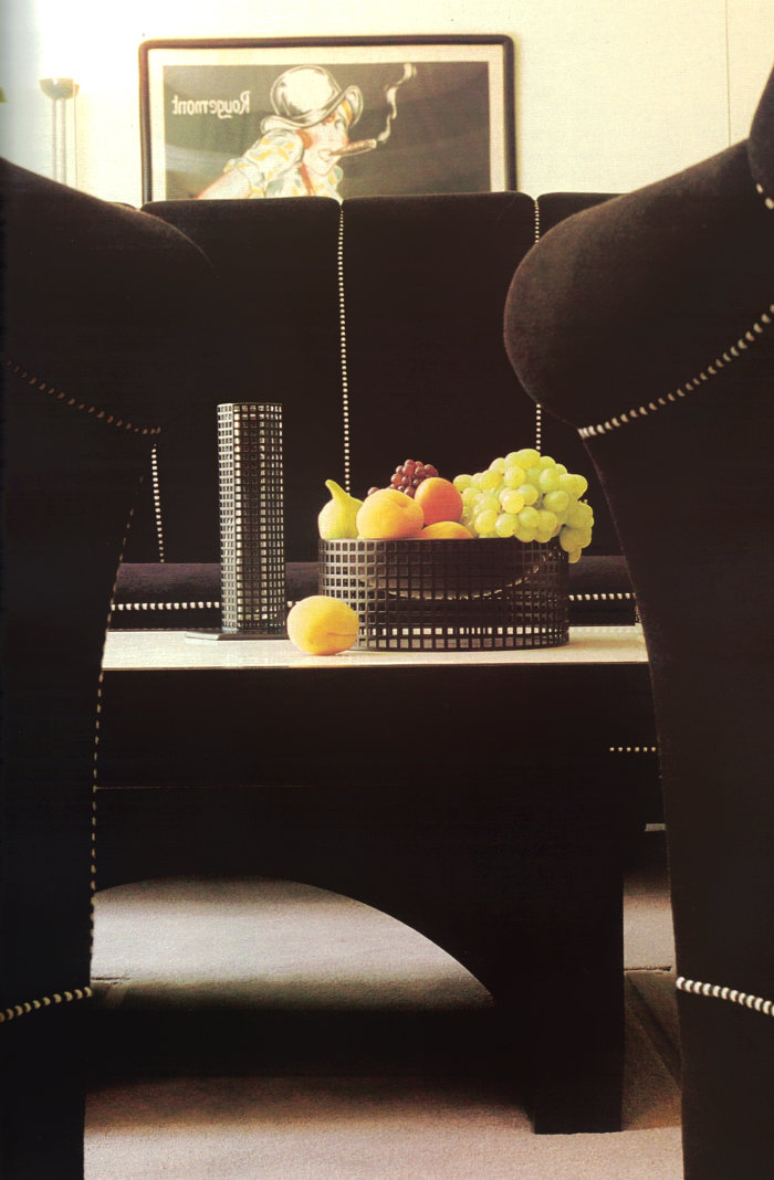 Sleek modern '80s sitting area with a bowl of produce