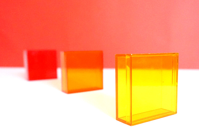 AMAC square boxes in red, yellow and orange
