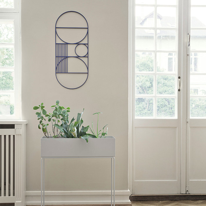 Blue wall hanging and white planter box from ferm LIVING